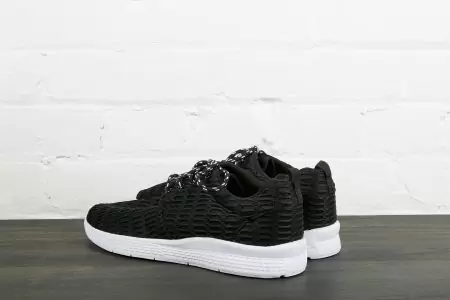 Black sneakers with white sole